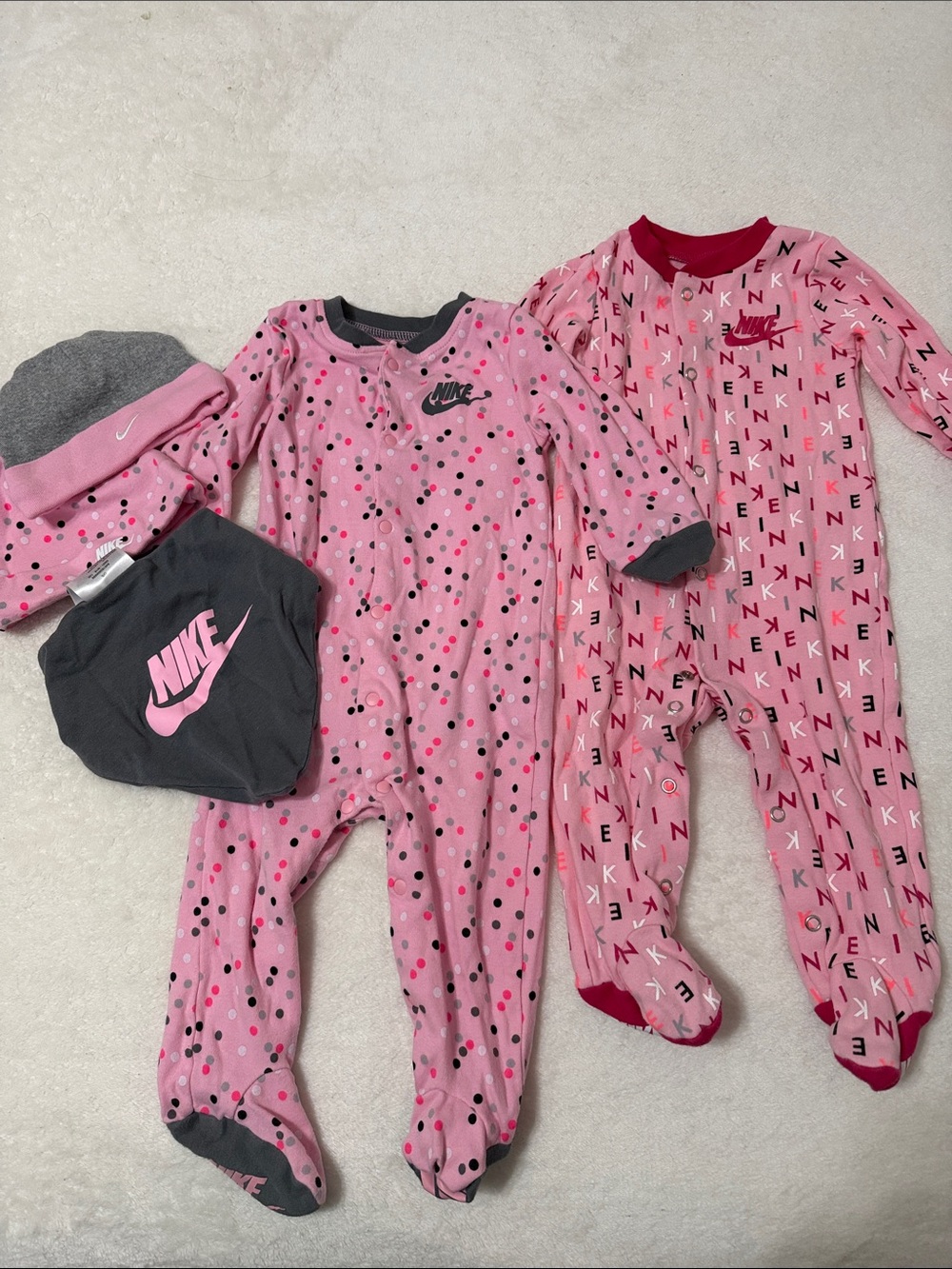NWOT 5 Piece Nike Baby. Pink Polka Dot & Logo Print Baby Footed One-Pieces. 9mo